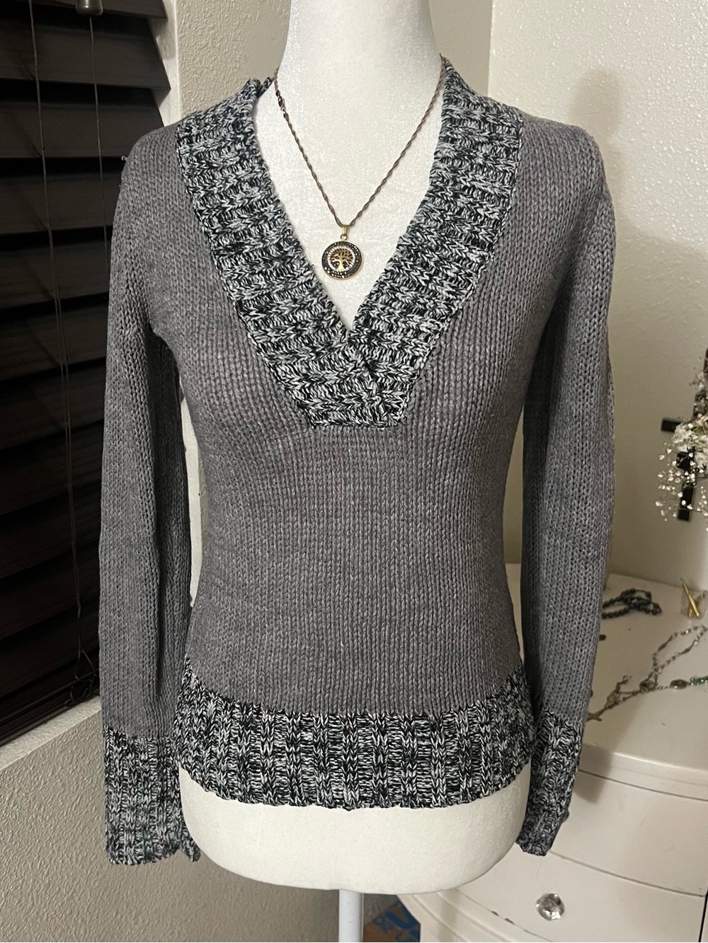 grey v neck sweater